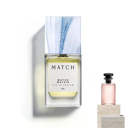 Perfume bottle labeled 'MATCH' with a smaller bottle on a light background